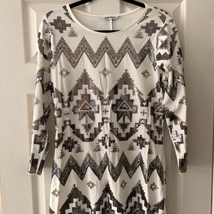 White and sequence form fitting dress